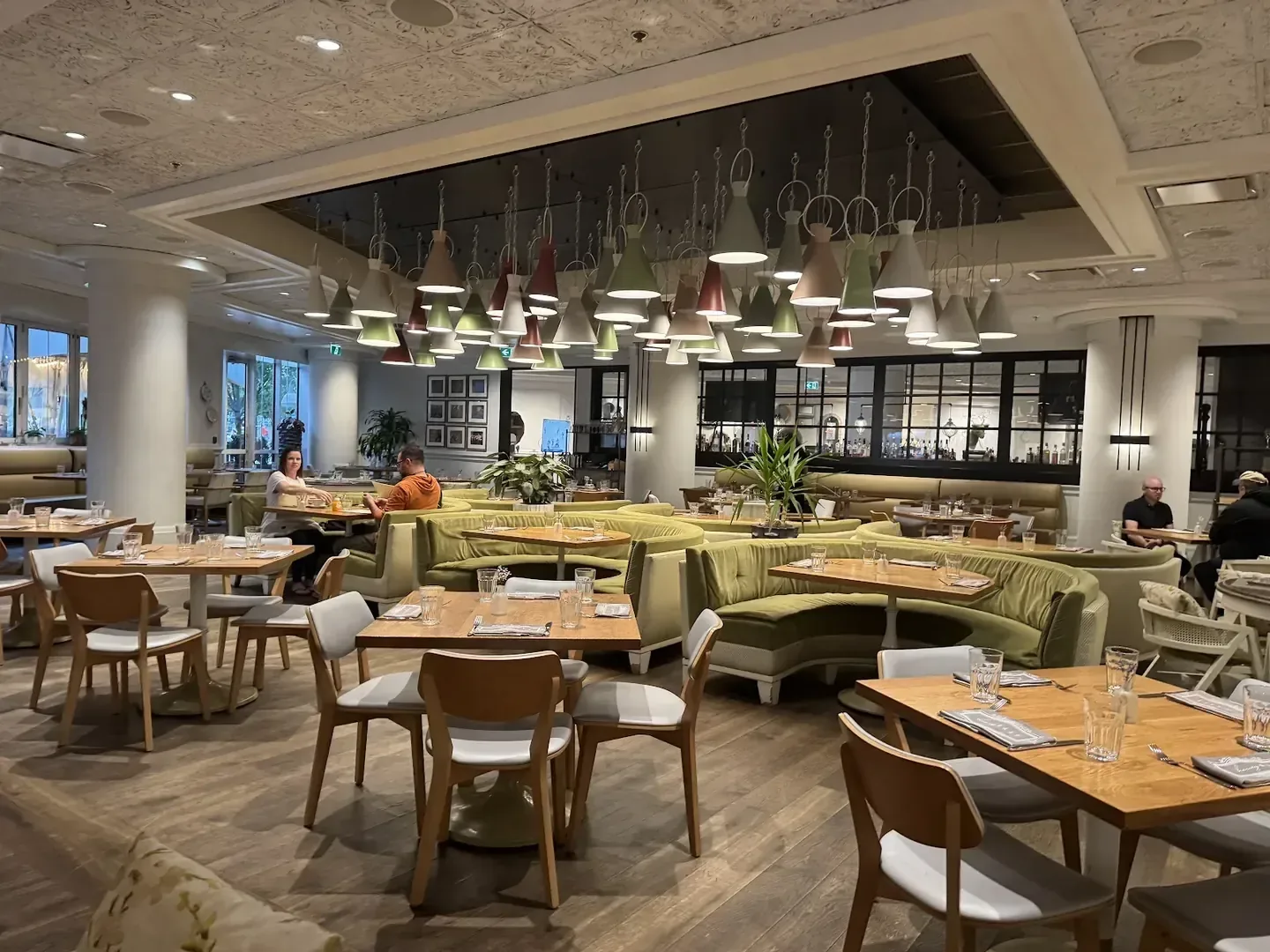 Dining room with hanging pendant lights at JW Marriott Parq Vancouver, Vancouver